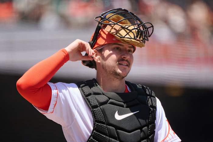 SF Giants catcher Patrick Bailey (14) walks on the field with his catchers mask lifted at Oracle Park (2023)